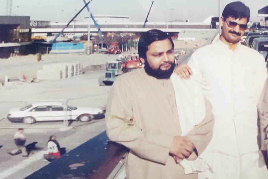 Brahmachari Girish Ji at Brussels Airport, Belgium in winter 1993 with Shri Ved Prakash Sharma